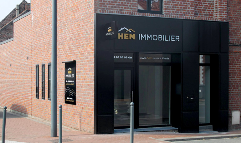 facade bois style vieux magasin lillois hem immobilier ambiance wood thomas rotteleur compagnon charpentier